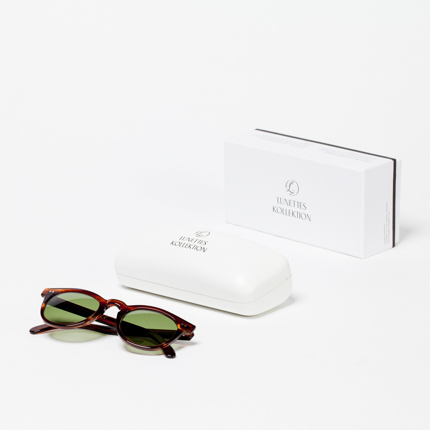 Horn-colored "NOBLESSE OBLIGE" Sunglasses with Green Lenses